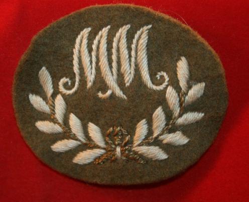 Canadian / British Army: MM Mortar Man (Motor Mechanic) Cloth Trade Badge